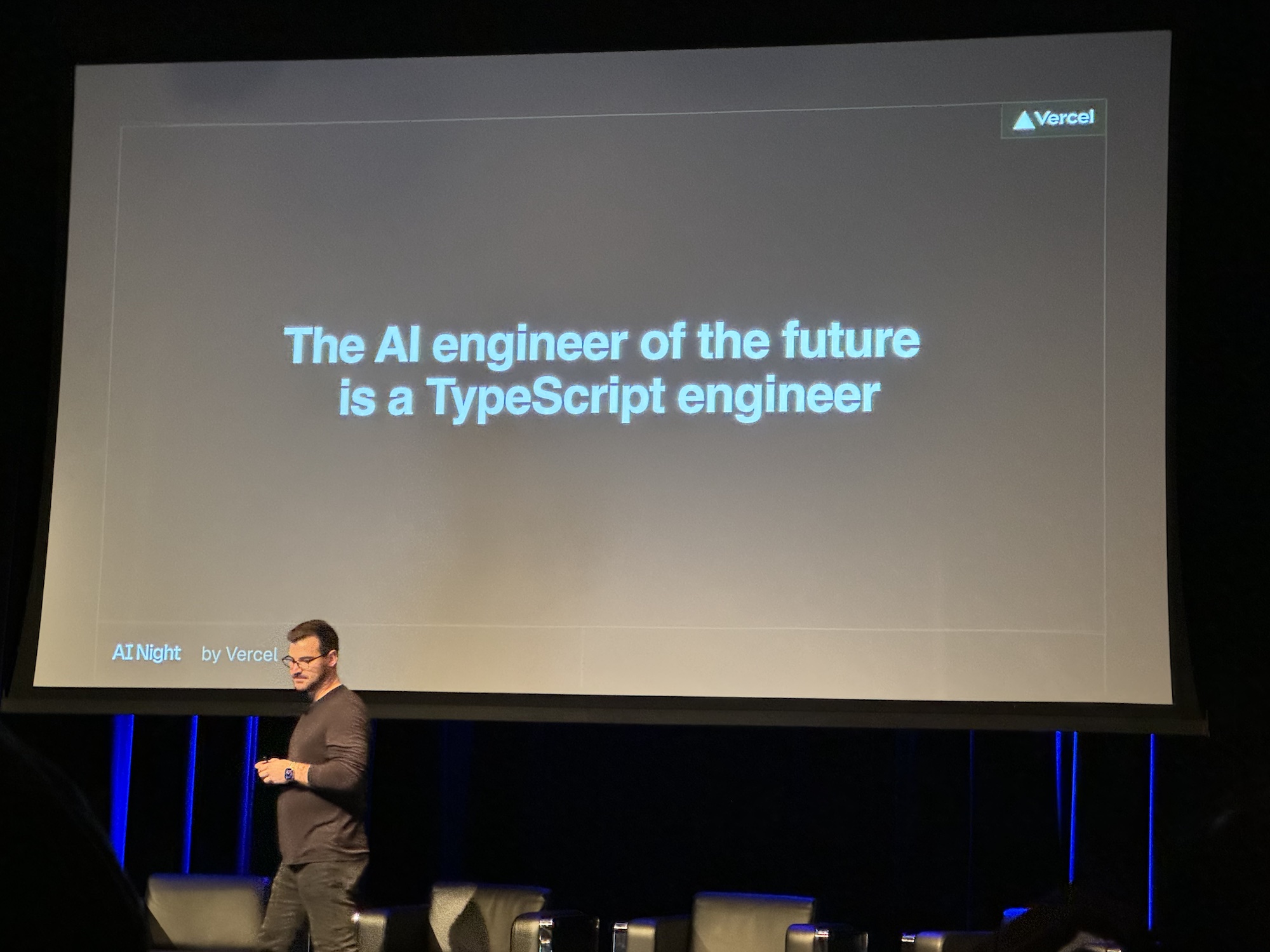 Jared Palmer standing in front of a black slide with white text reading "The AI engineer of the future is a TypeScript engineer"